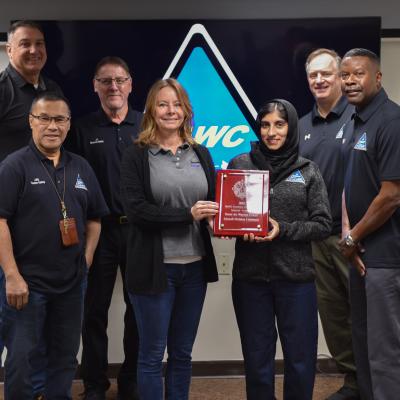 The Mission Safety Team stands with the Joint Base McGuire-Dix-Lakehurst Squadron Excellence in Safety Large Industrial Award