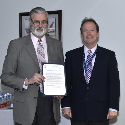 Lakehurst Mentor of the Year Brian Barr receives his certificate from Technical Director Jack Martenak
