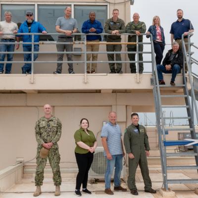 Group photo of the team that delivered new communications equipment for the E-6B Mercury at Tinker Air Force Base.