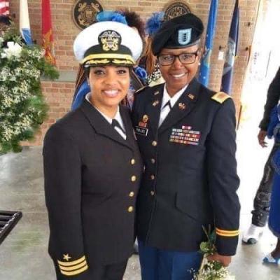 Price-Jordan stands with cousin Phillips