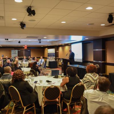 NAWCAD Lakehurst Executive Director Sean D. Brennan speaks at ProcurementCON