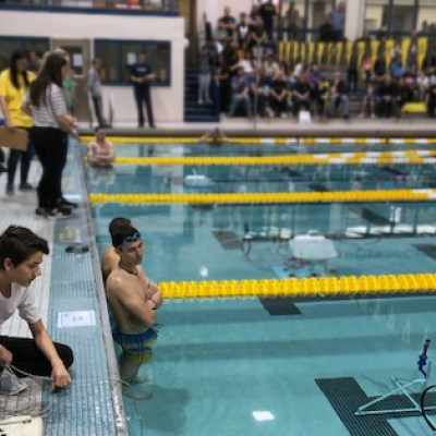 Students operate underwater robots in the Rowan University pool