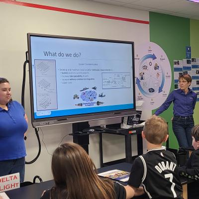 STARBASE volunteers with students
