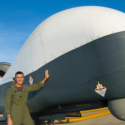 Thompson with MQ-4C Triton