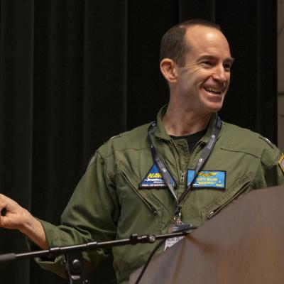 Rear Adm. Scott Dillon speaks during 48th annual EW conference