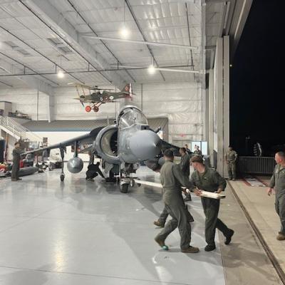 Parking Harrier AV-8B II+ in hangar