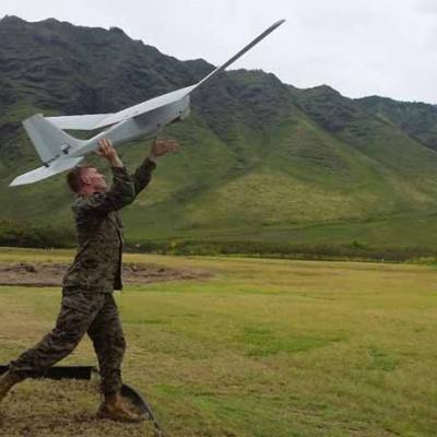 A Marine launches a RQ-20 Puma unmanned aircraft system (UAS) from Marine Corps Base Kaneohe Bay, Hawaii, as part of a Small UAS certification course taught at the Training and Logistics Support Activity (TALSA) Pacific. The facility opened its doors Nov. 5 and joins TALSA East and West coast facilities where Marines become qualified SUAS operators. (Photo courtesy U.S. Marine Corps)