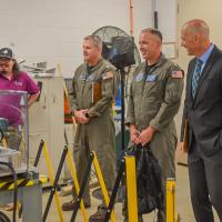 Guests tour a lab at NAWCAD Lakehurst