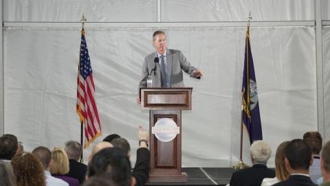 DASN (RDT&E) Dr. Brett Seidle gestures while speaking at the 2022 NISE TEM