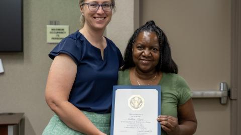 AIM-9 Technical Project Office lead, Jill Patterson presents Colleen Major with a 35-year length-of-service award during a ceremony June 2 in China Lake, California. 