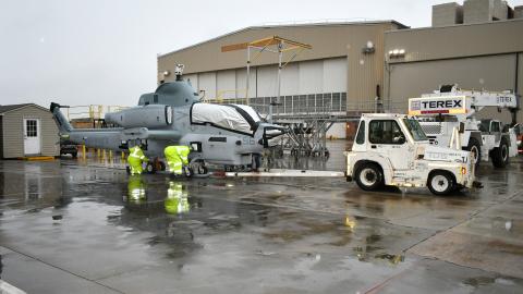 Transportation crew prepares to move H-1 aircraft