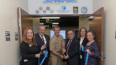 Ribbon Cutting under Central Florida STARBASE sign