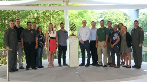 Group gathers with "This is the Way" Award