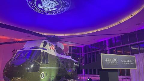 Presidential Helicopter Sits in a Museum with a sign that reads 41@100 for the 41st President's 100th Birthday