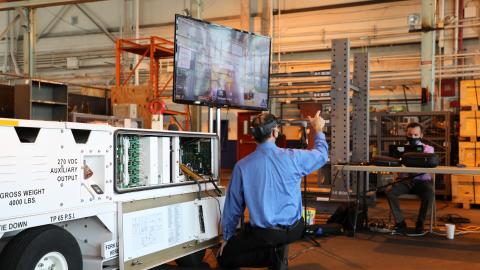 Navy engineers demonstrate the Augmented Reality Remote Maintenance Support Service during a recent technology exercise
