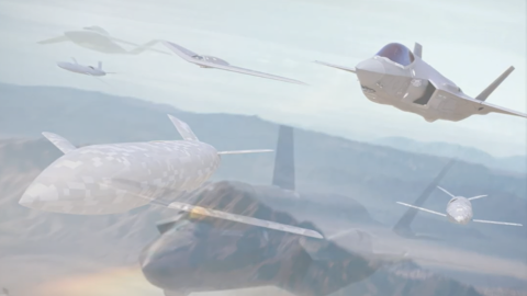 A graphic depicts an F-35 Lightning II operating alongside unmanned aircraft to illustrate the systems' integration.