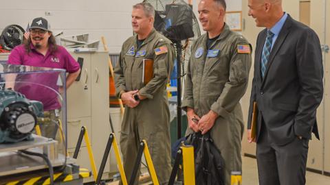 Guests tour a lab at NAWCAD Lakehurst