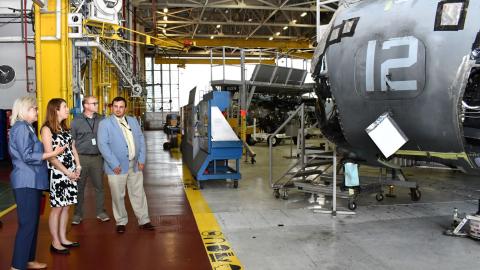 Group surveys H-53 aircraft production line in hangar space