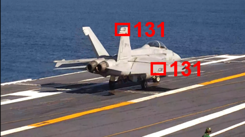 Jet on the deck of an aircraft carrier