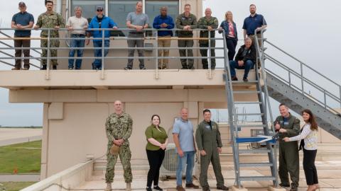 Group photo of the team that delivered new communications equipment for the E-6B Mercury at Tinker Air Force Base.