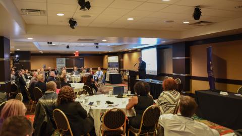 NAWCAD Lakehurst Executive Director Sean D. Brennan speaks at ProcurementCON