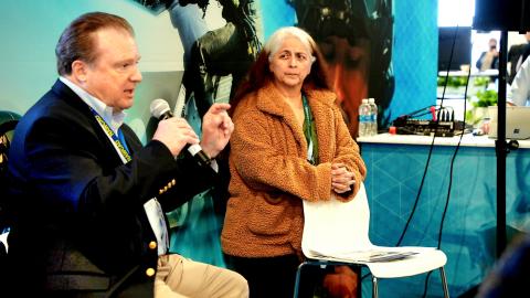 Larry Butts, deputy director of Naval Air Warfare Center Aircraft Division (NAWCAD), left, and Irma Alexander, deputy director of NAVAIR Headquarters, field questions from potential industry partnerships about collaborating with NAVAIR in its mission to supply the warfighter.