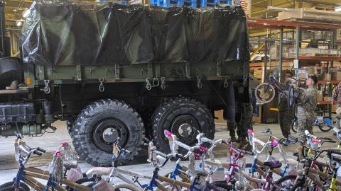 Bikes being loaded onto Toys for Tots truck