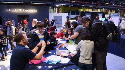 Team Members from Naval Air Warfare Center Aircraft Division Lakehurst take part in Kids Week at the Intrepid Museum