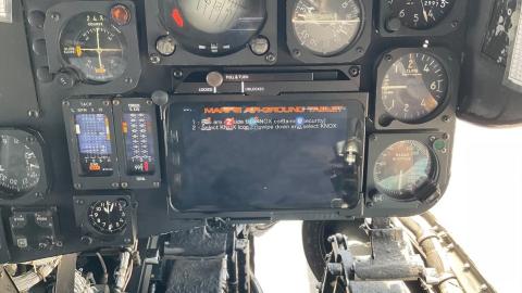 CH-53E cockpit showing dials and a small tablet-size screen